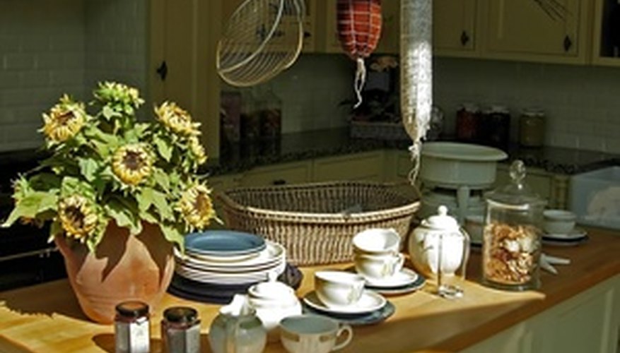 Use colorful kitchen accessories to draw attention away from dated appliances. Use colorful kitchen accessories to draw attention away from dated appliances.
