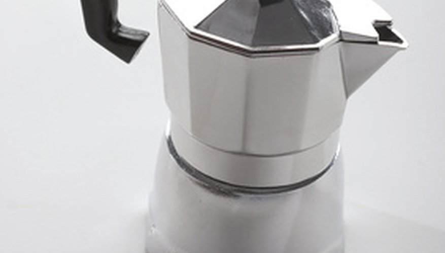 Photo Credit: coffee pot image by AGphotographer from <a href='http://www.fotolia.com'>Fotolia.com</a> Traditional stove-top coffee pots contain an internal structure that makes distilling liquids easy.