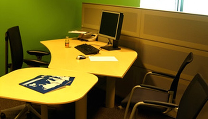 Photo Credit: work place image by araraadt from <a href='http://www.fotolia.com'>Fotolia.com</a> Government offices often have toll-free numbers.
