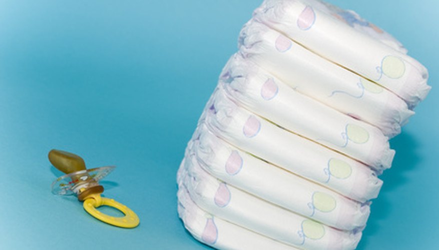Turn an ordinary baby gift into a baby shower centerpiece. Turn an ordinary baby gift into a baby shower centerpiece.