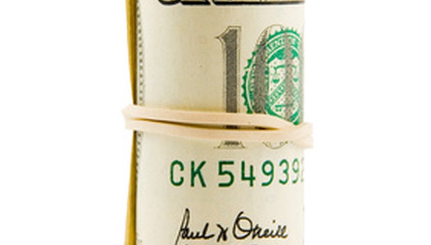 Photo Credit: dollars image by Anton Gvozdikov from <a href='http://www.fotolia.com'>Fotolia.com</a> Country can spend more than its income