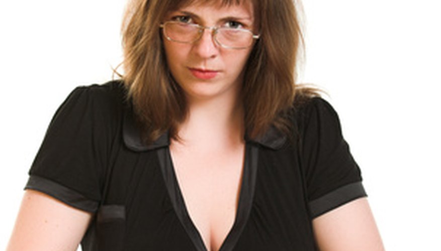 Photo Credit: Strict woman image by Vasiliy Koval from <a href='http://www.fotolia.com'>Fotolia.com</a> FHA appraisal guidelines are very strict