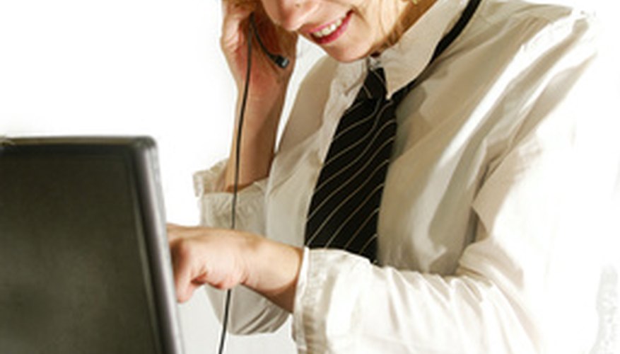 Photo Credit: femme d'affaire image by Magalice from <a href='http://www.fotolia.com'>Fotolia.com</a> Many personal computers come with basic recording software preloaded.