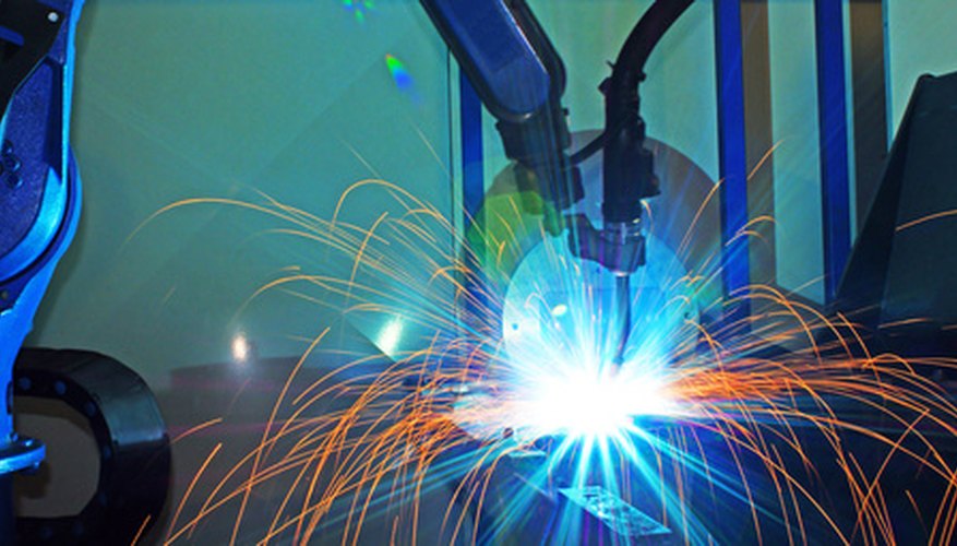 Robots en la fabricación de autos.