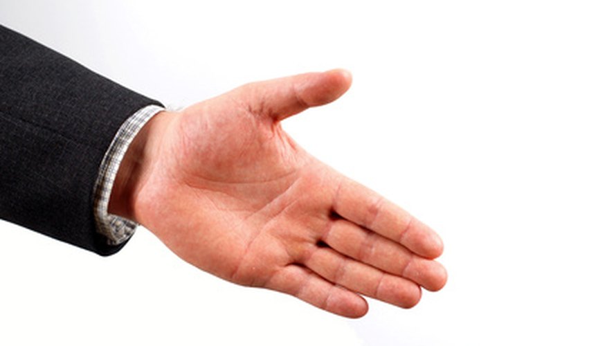 Photo Credit: handshake image by Adam Borkowski from <a href='http://www.fotolia.com'>Fotolia.com</a> All parties should reach an amicable agreement.
