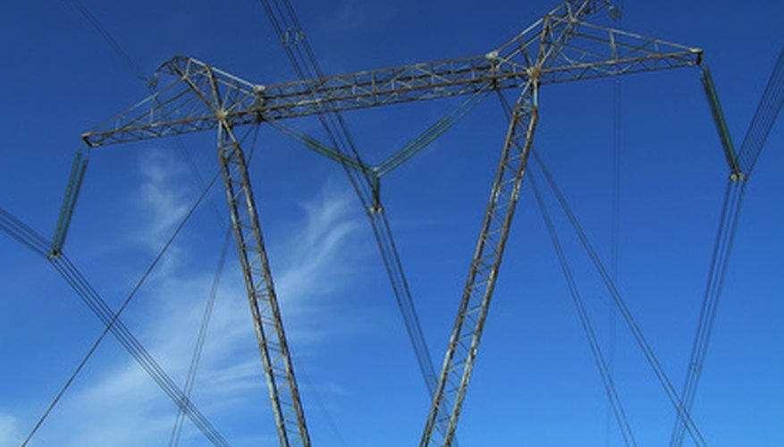 Photo Credit: transmission line image by Vladimir Kirienko from <a href='http://www.fotolia.com'>Fotolia.com</a> Transmission lines must have some sag to them.
