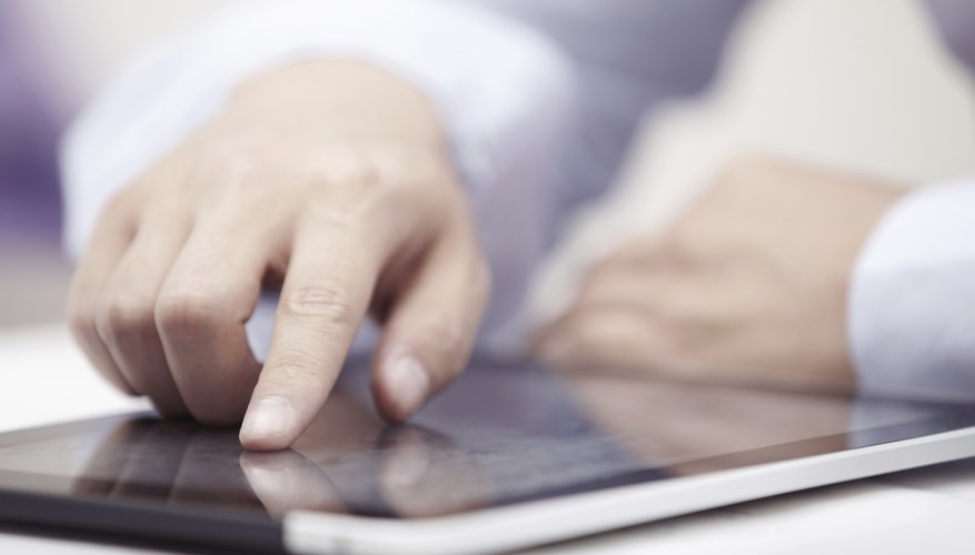 Photo Credit: Arman Zhenikeyev/iStock/Getty Images Man researching online