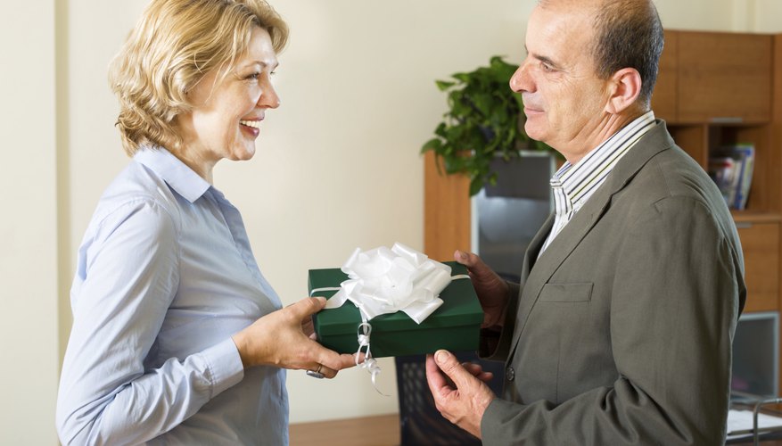 Irs Rules On Employee Gifts Bizfluent Woman Receiving A Gift