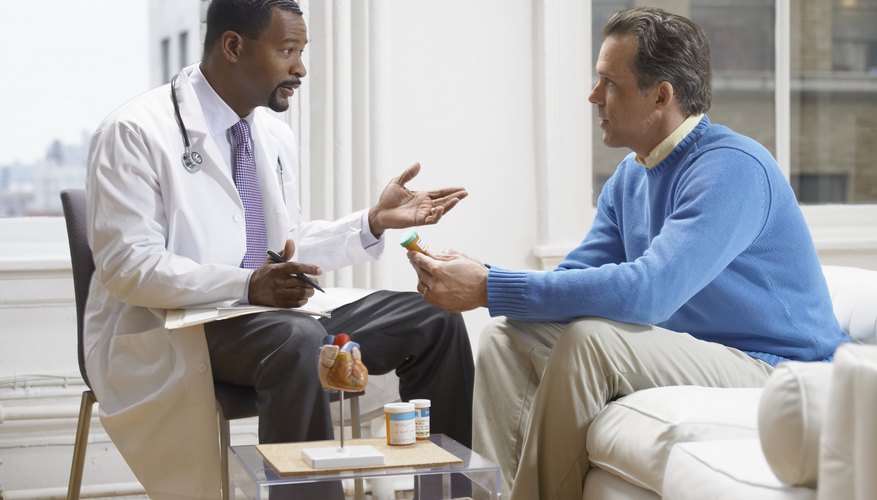 Man talking to doctor Man talking to doctor