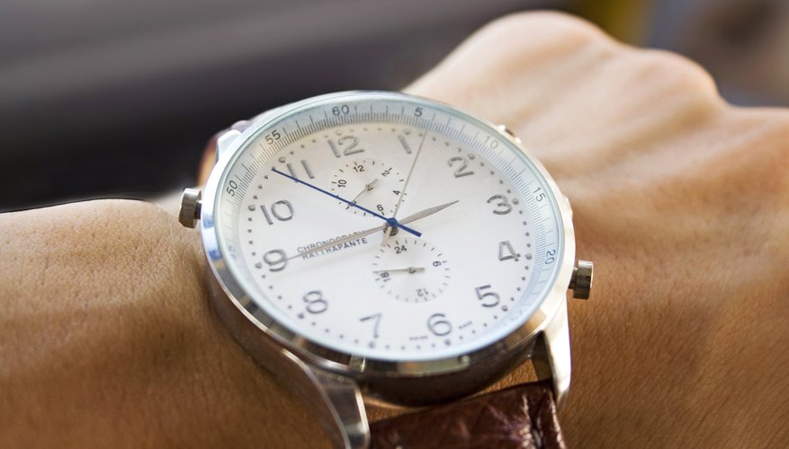 A man is wearing a luxury watch.