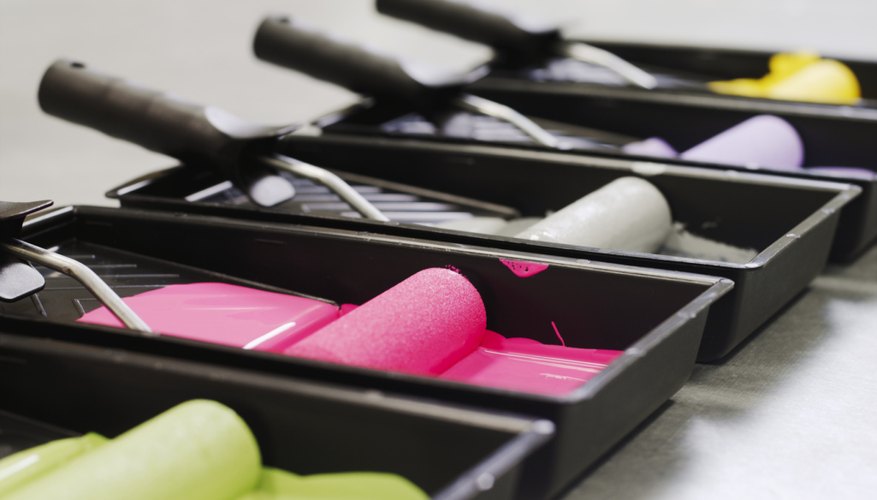 Assorted paint colors including green and its complement pink. Assorted paint colors including green and its complement pink.