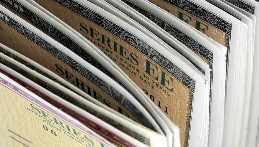 A close-up of a stack of U.S Treasury savings bonds.