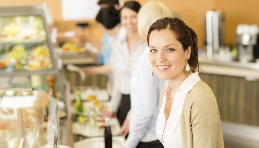 Business woman take cafeteria lunch smiling