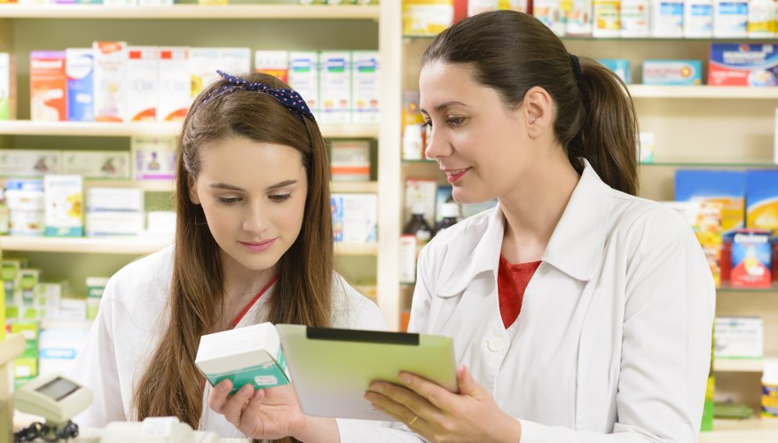 Two women in a drugstore.