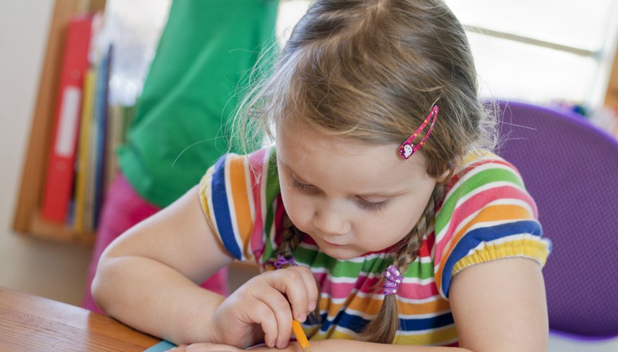 Girl focuses on book at school Girl focuses on book at school