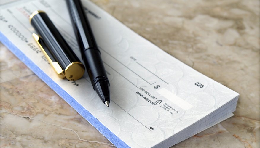Pen on a checkbook