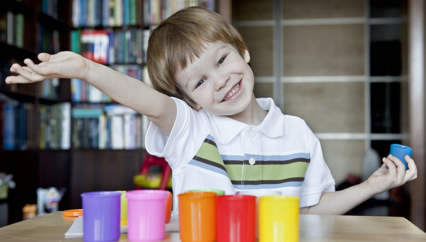 Boy holds putty Boy holds putty