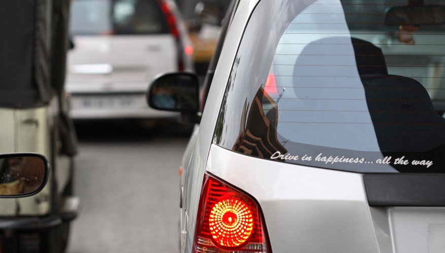 Partial view of a car on the raod