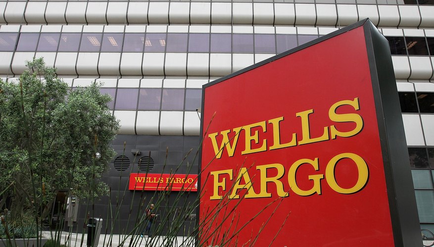 A Wells Fargo sign in front of a bank branch in California.