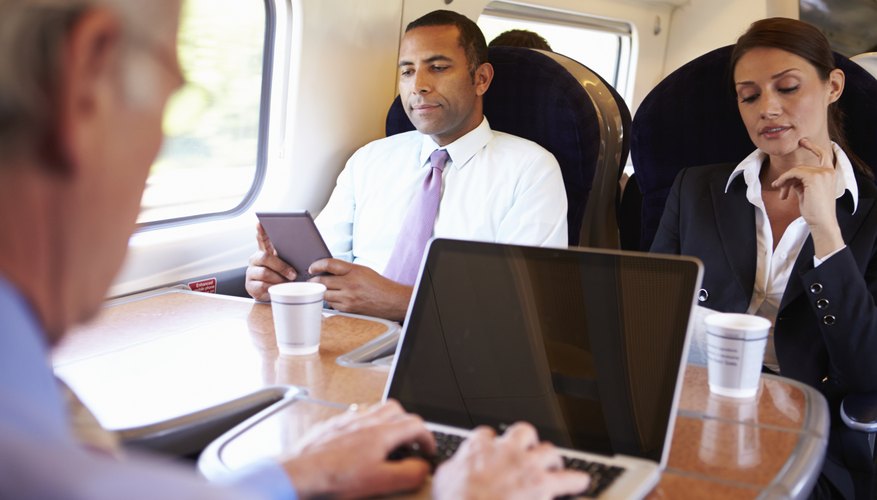 Photo Credit: monkeybusinessimages/iStock/Getty Images People using portable devices during a morning train commute.