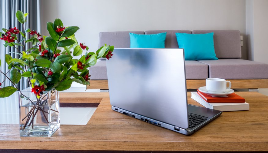 A modern living space with a sleek wooden desk. A modern living space with a sleek wooden desk.