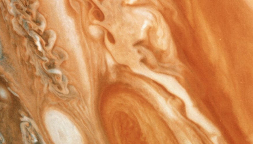 Photo Credit: Jupiterimages/Photos.com/Getty Images The whorls in Jupiter's atmosphere are long-lived and powerful storms.