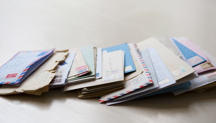 Letters with opened envelopes