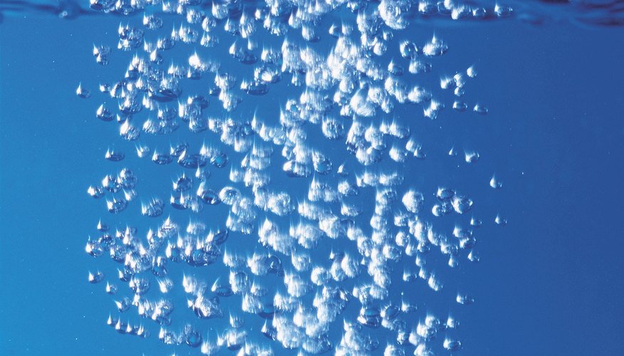 Bubbles become larger as they rise to the surface due to decreasing pressure. Bubbles become larger as they rise to the surface due to decreasing pressure.