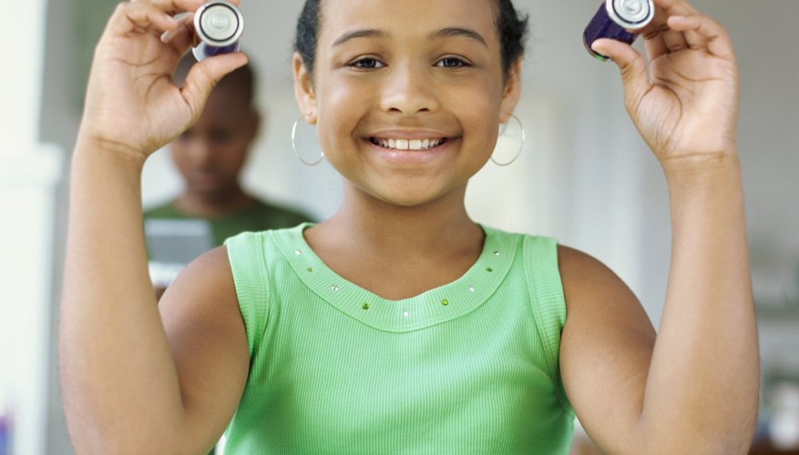 Photo Credit: George Doyle/Stockbyte/Getty Images Batteries can discharge if a circuit connects the positive and negative ends.