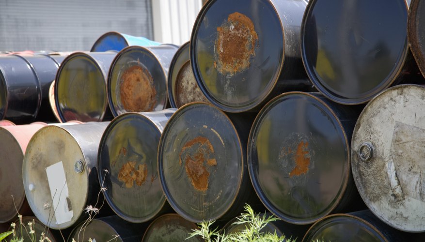 Chemicals stored in rusting containers can leak into soil, causing contamination. Chemicals stored in rusting containers can leak into soil, causing contamination.