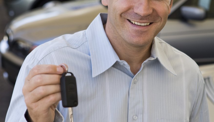 Man holding car keys