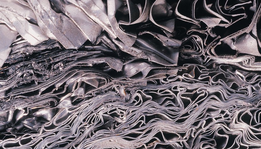 Photo Credit: Goodshoot/Goodshoot/Getty Images sheets of scrap metal