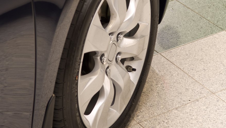 Tire and fender of new car in showroom