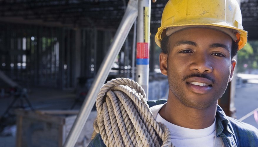 Portrait of construction worker with rope