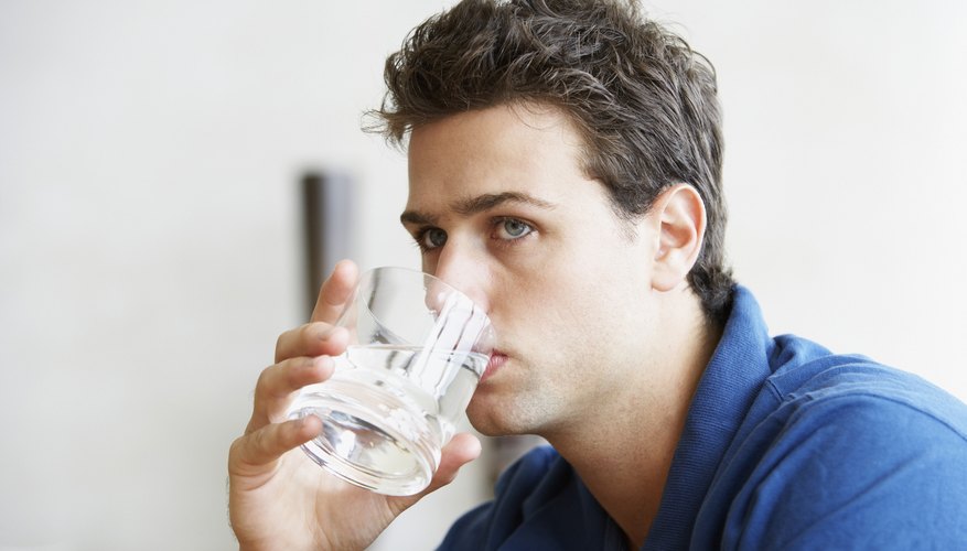 Man drinking water Man drinking water