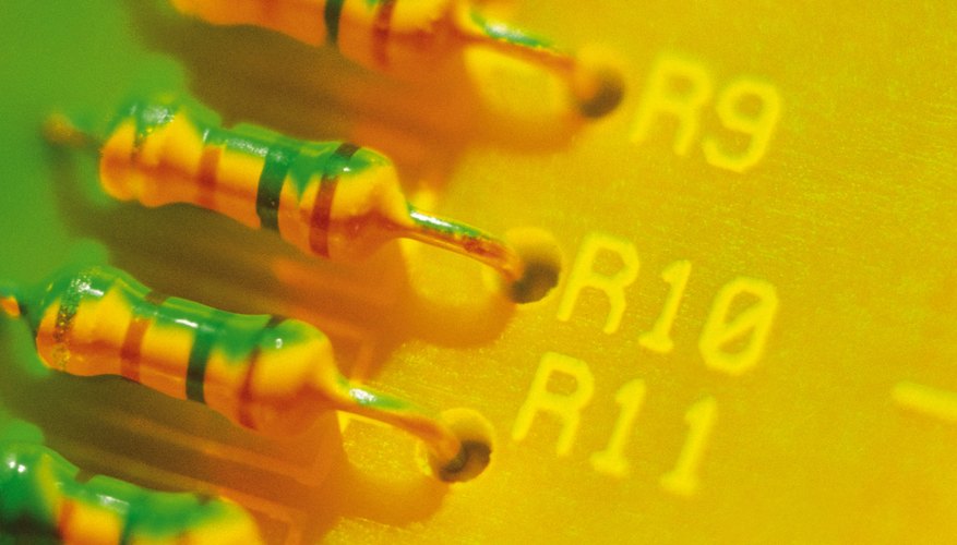 Photo Credit: Comstock/Comstock/Getty Images Adding resistors is one way to lower a circuit's amperage.