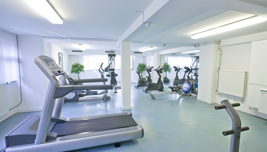 A small gym with treadmills and cardio machines.
