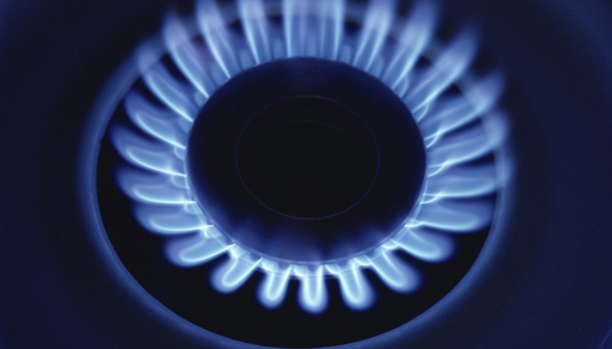 Puedes ajustar la llama de una cocina a gas.