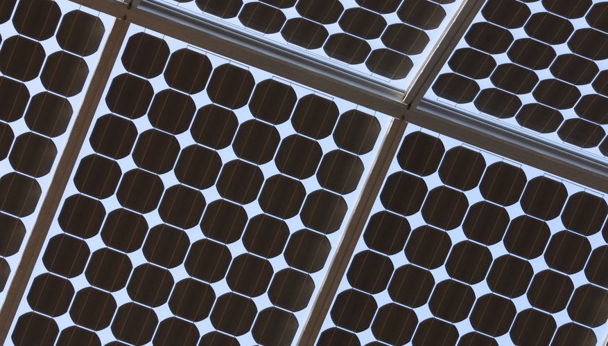 Photo Credit: Hemera Technologies/AbleStock.com/Getty Images solar cells
