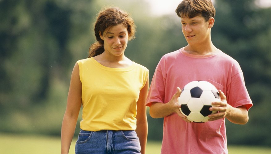 Photo Credit: Jupiterimages/Photos.com/Getty Images Mitosis and meiosis work together to form males and females.
