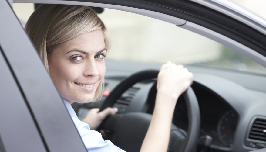  portrait of woman driving a car