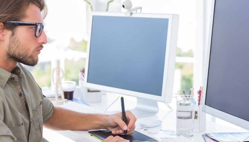 Graphic designer using graphics tablet