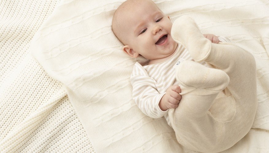 Yellow stains in baby clothing can be unsightly. Yellow stains in baby clothing can be unsightly.