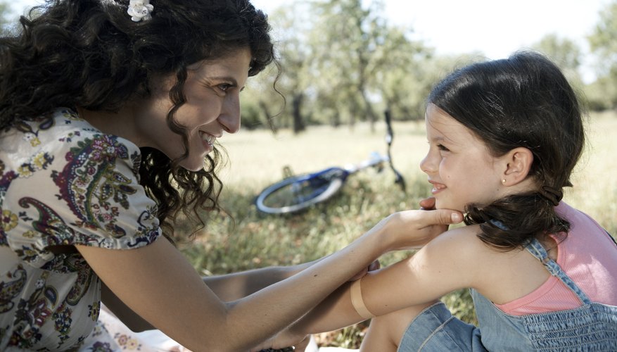 Mother and daughter talking outside Mother and daughter talking outside