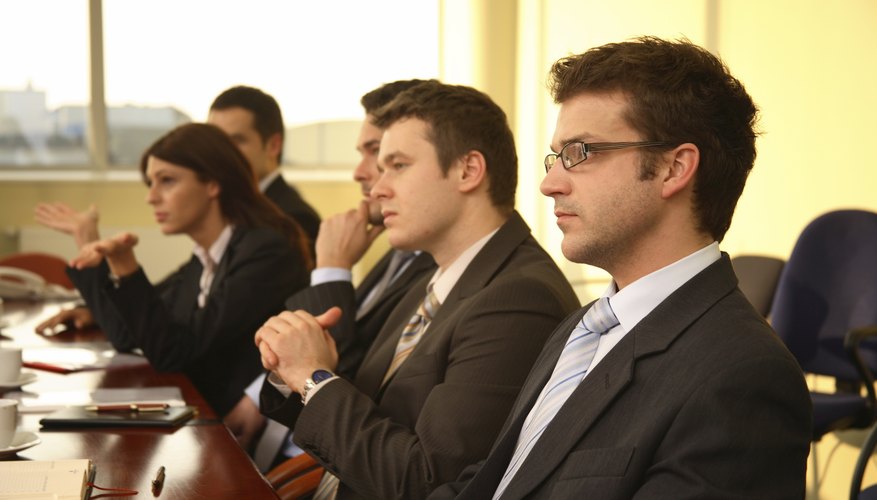 Five business persons at a Conference,interview