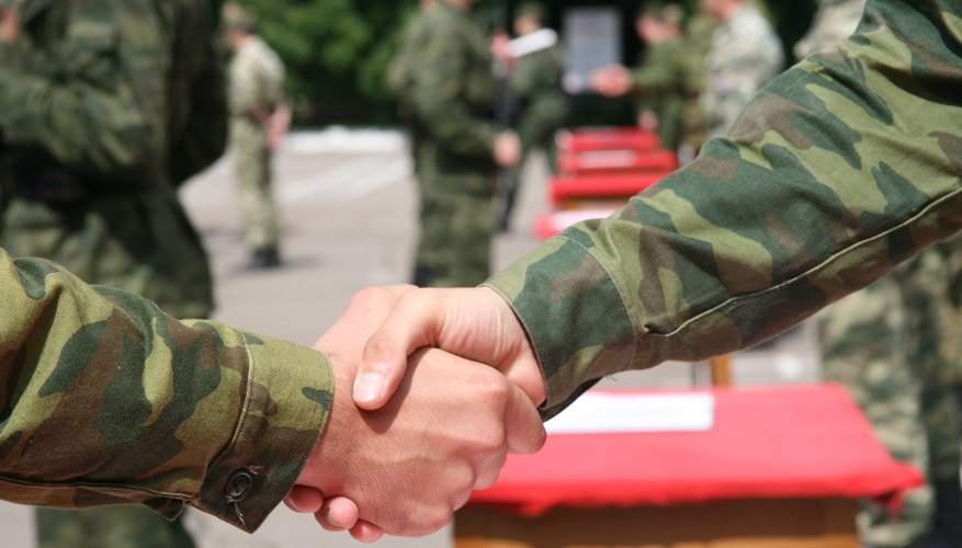 Soldiers shaking hands.