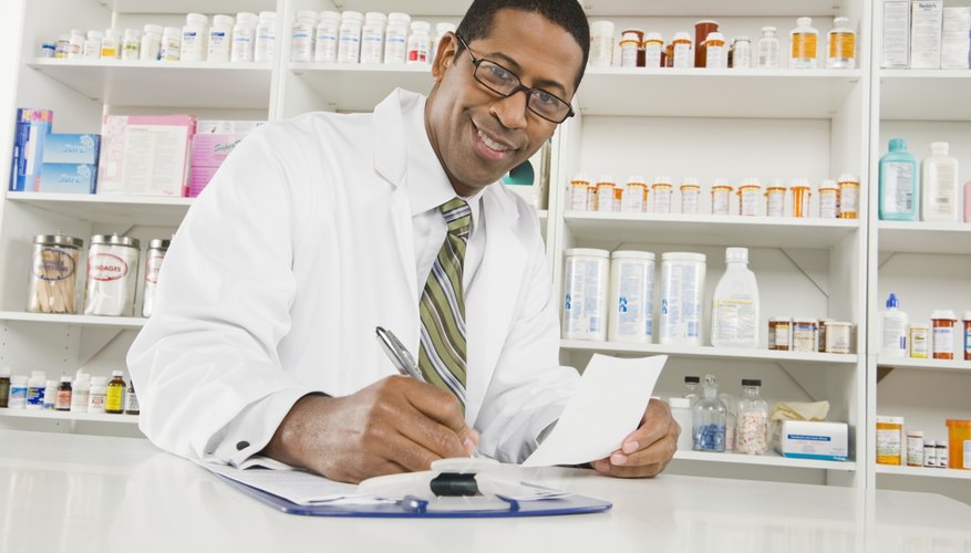 Male pharmactist working in pharmacy