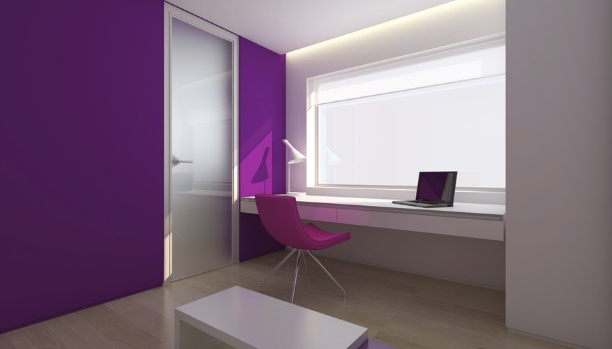 Photo Credit: Vlajs/iStock/Getty Images Office accent wall in purple