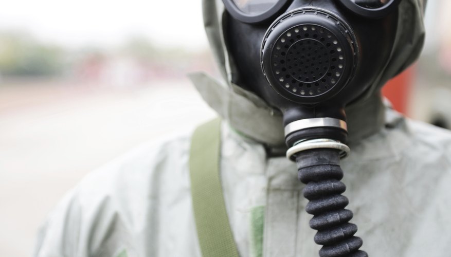 Photo Credit: hxdbzxy/iStock/Getty Images Man wearing gas mask