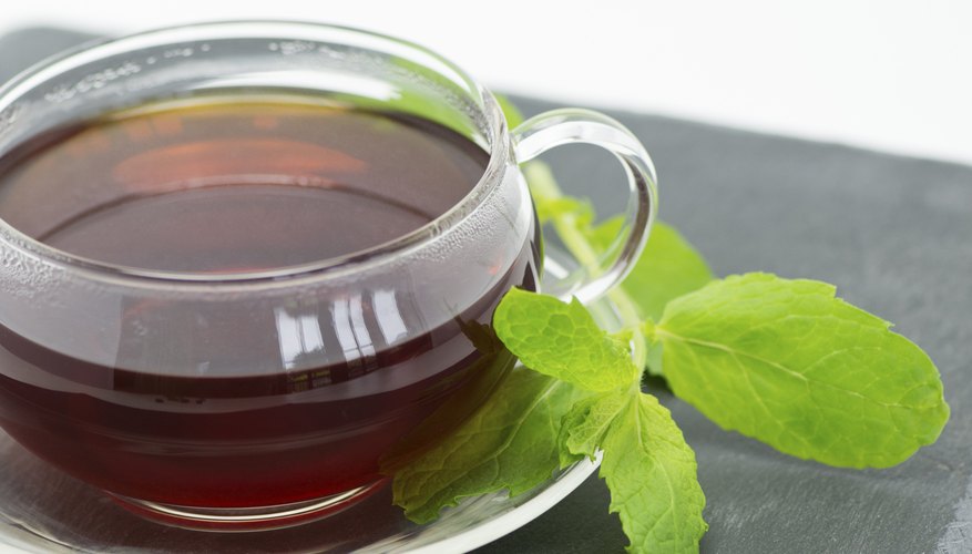A glass cup of tea. A glass cup of tea.